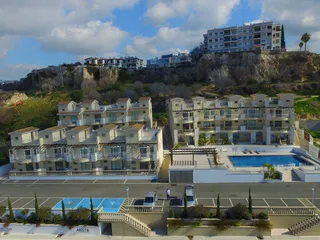 Резиденция премиум класса с бассейнами и садами в самом центре Пафоса, Кипр